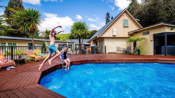 Outdoor pool, open 8:00 AM to 9:00 PM, pool umbrellas, pool loungers