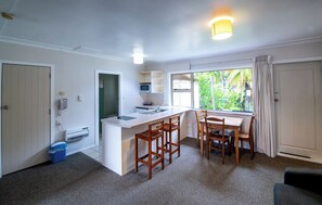 Superior Apartment, 1 Bedroom | Living area | 40-inch Smart TV with digital channels