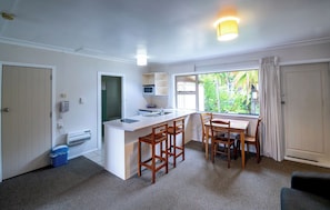 Superior Apartment, 1 Bedroom | Living area | 40-inch Smart TV with digital channels