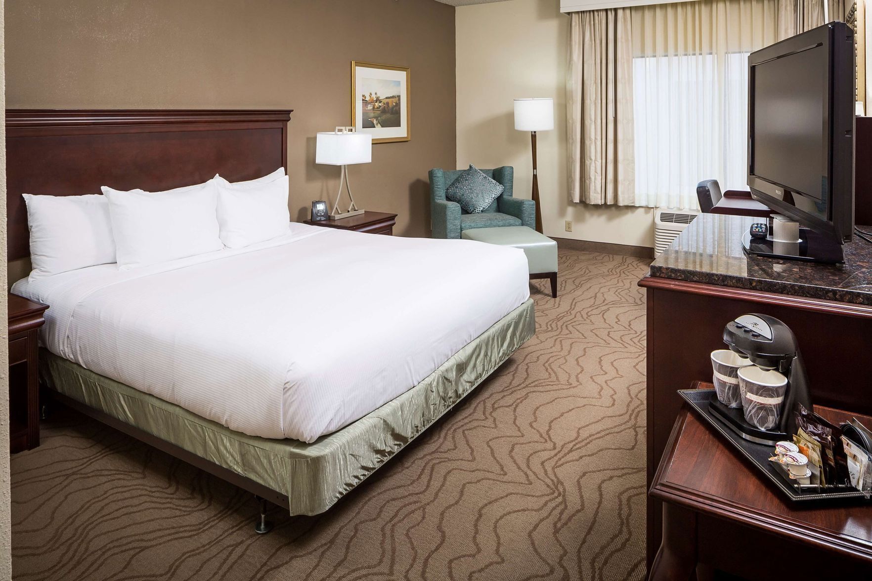 Hypo-allergenic bedding, in-room safe, blackout drapes