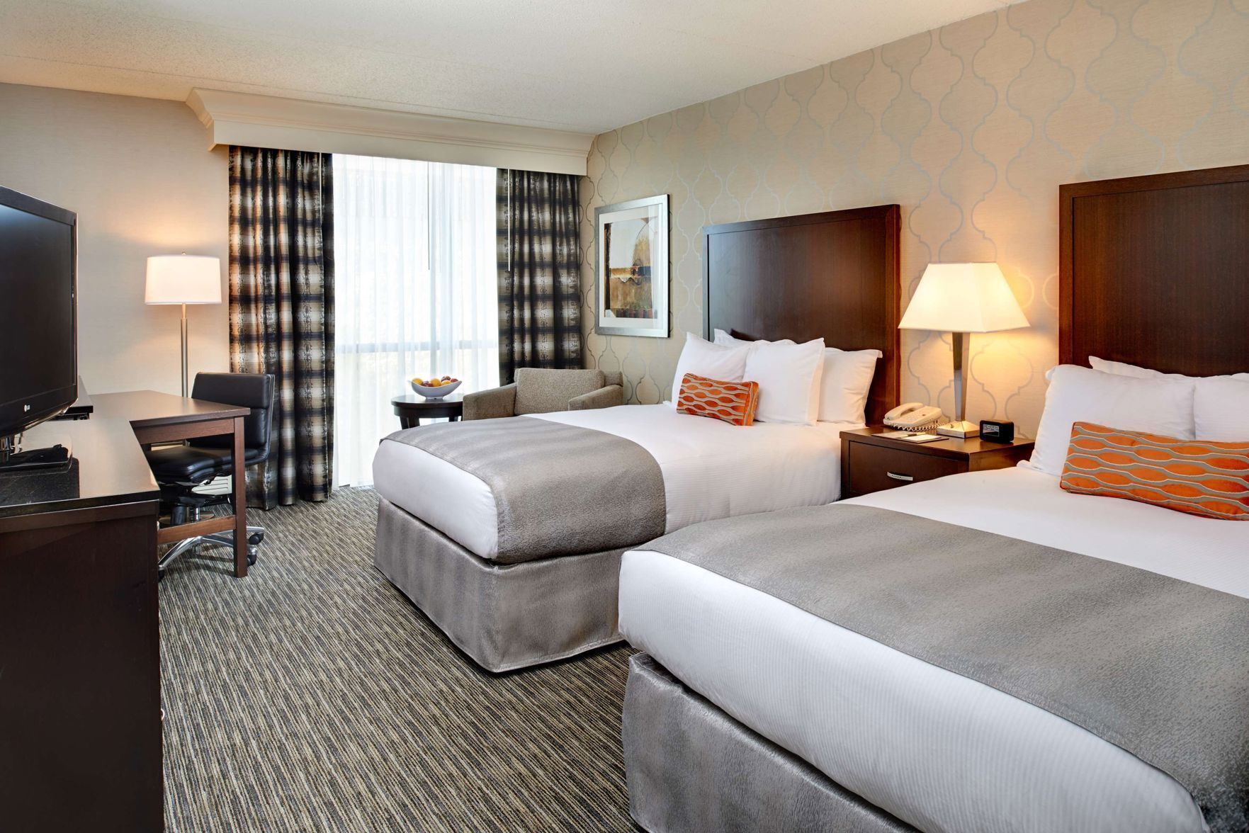 Premium bedding, down duvets, pillow-top beds, in-room safe