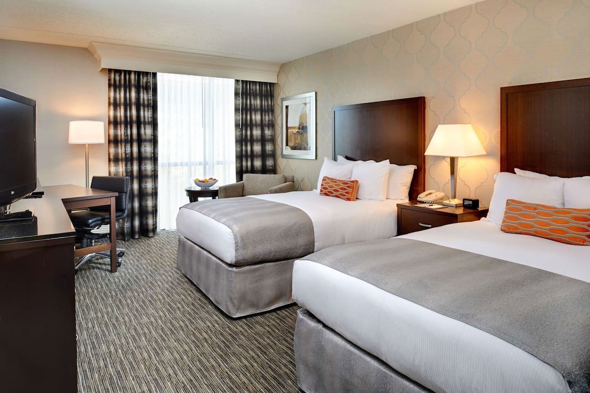 Premium bedding, down duvets, pillow-top beds, in-room safe