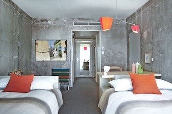 Hypo-allergenic bedding, down comforters, in-room safe, desk at The LINE Hotel