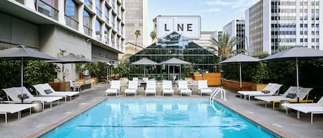 Outdoor pool, pool umbrellas, pool loungers