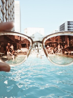 Outdoor pool, pool umbrellas, sun loungers - The LINE Hotel (Los Angeles)