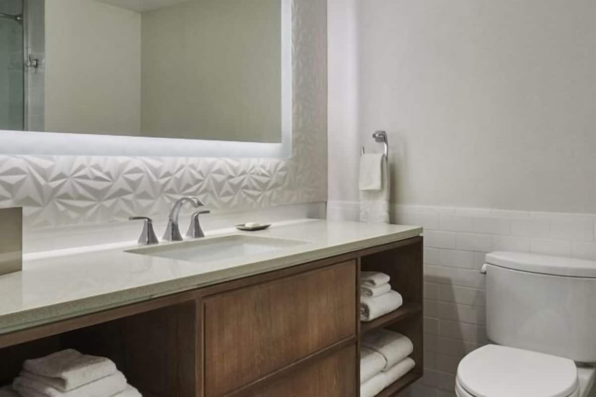 Shower, eco-friendly toiletries, hair dryer, towels