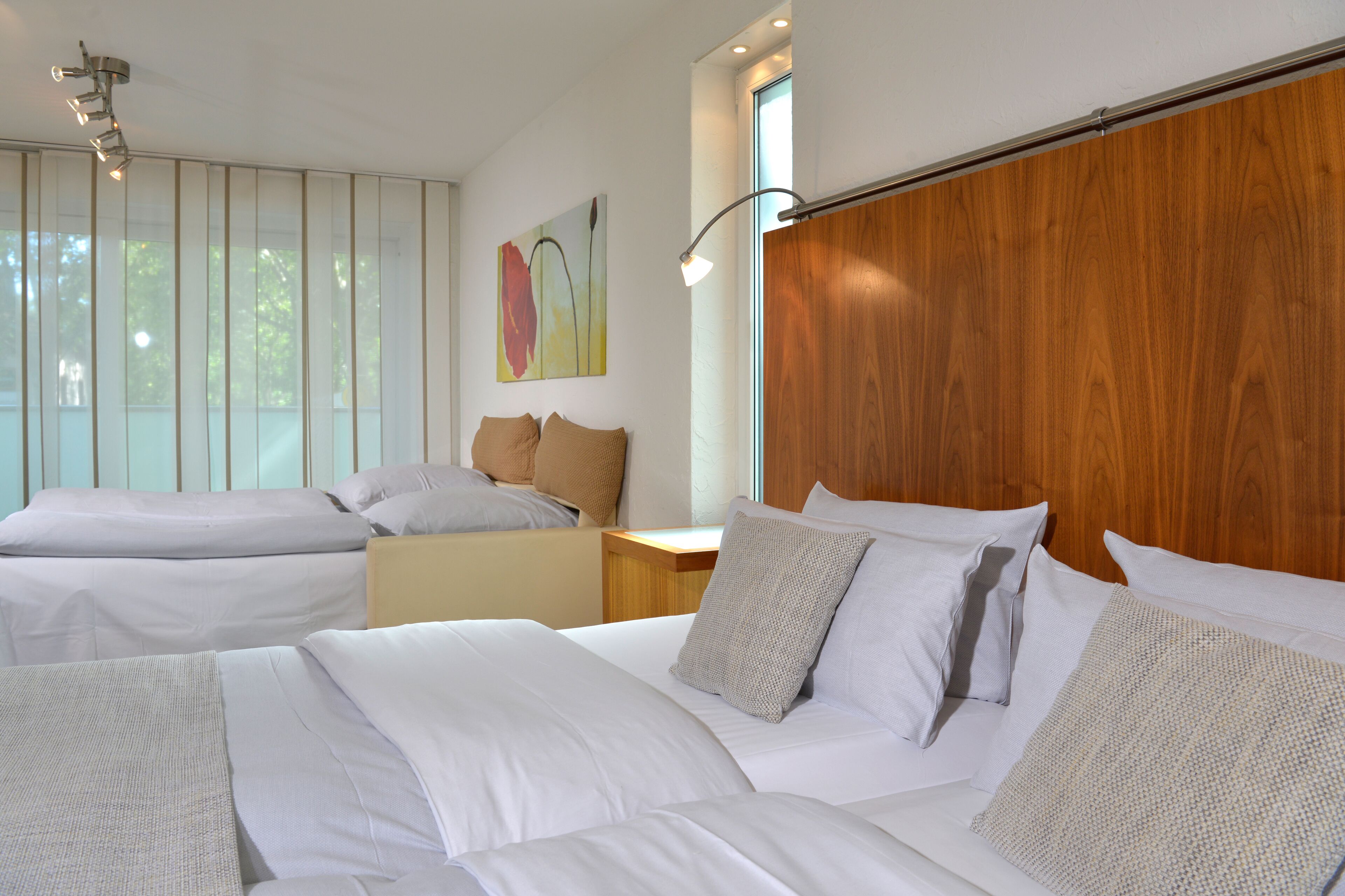 quadruple room | hypo-allergenic bedding, in-room safe, desk, blackout curtains