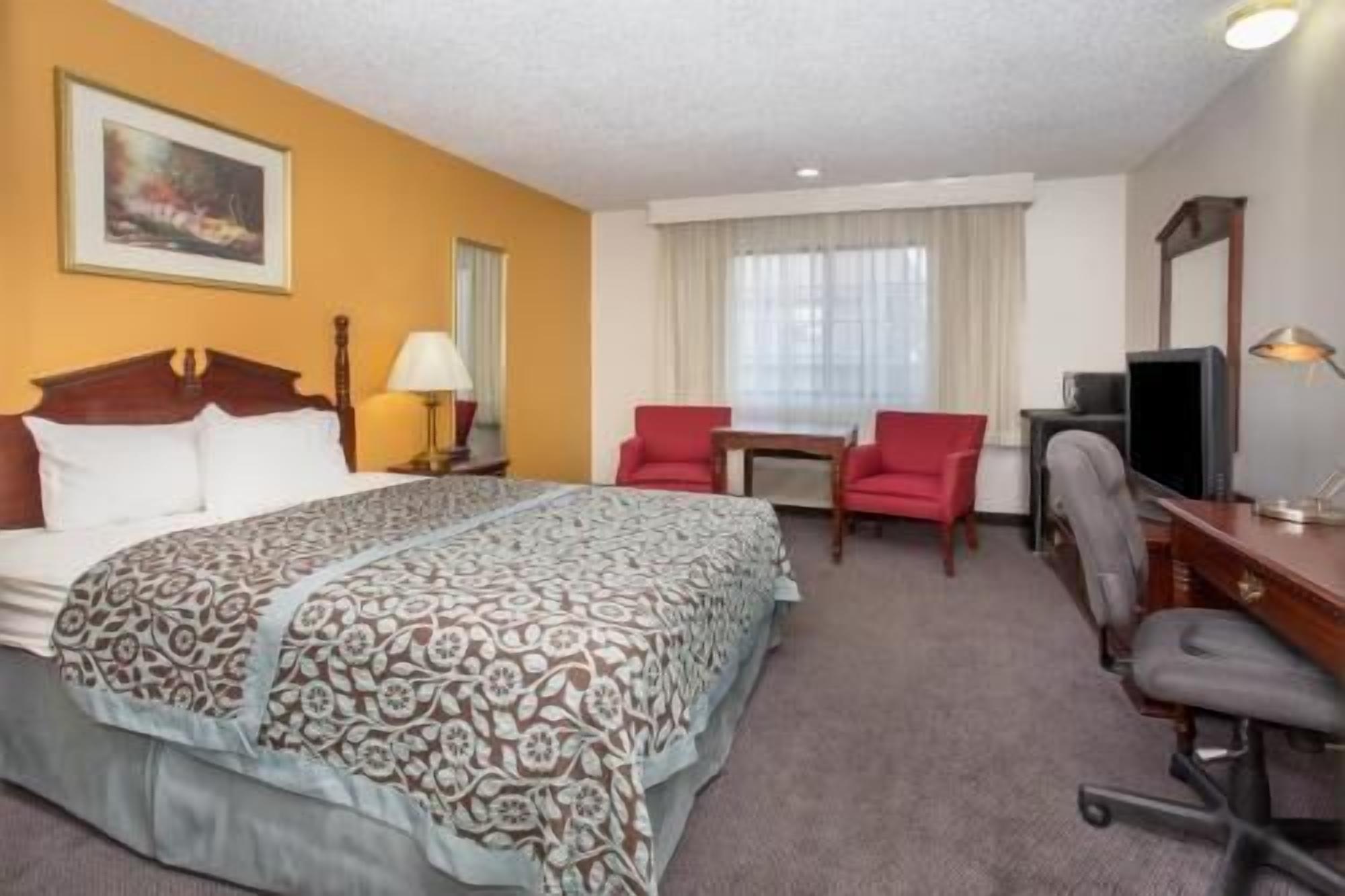Premium bedding, desk, laptop workspace, blackout curtains