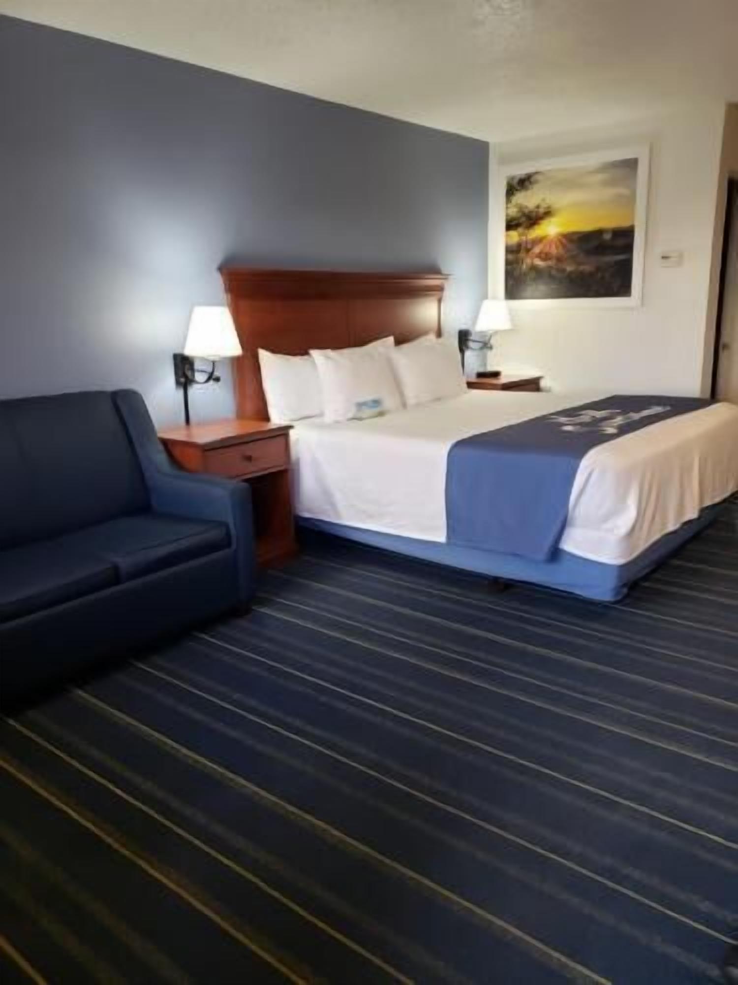 Premium bedding, desk, laptop workspace, blackout curtains