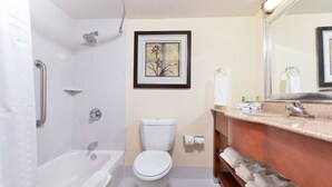 A bathroom with a bathtub, toilet, and sink. - Holiday Inn Express Harrisburg SW - Mechanicsburg by IHG (Mechanicsburg)