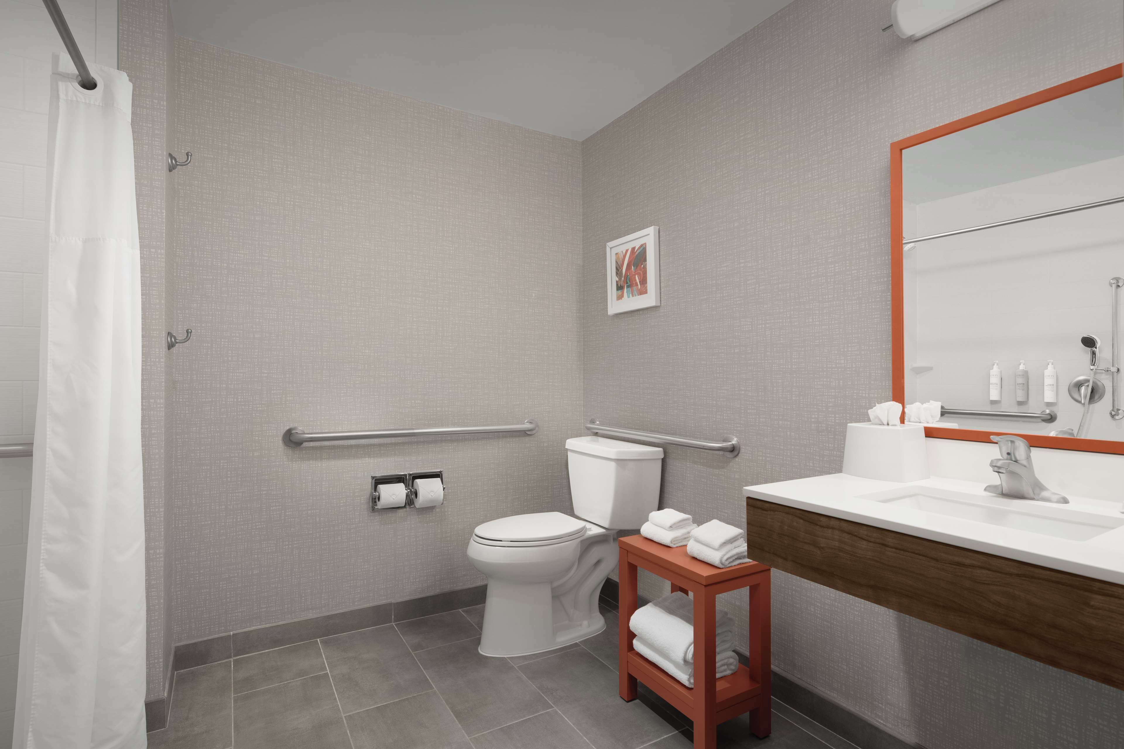 combined shower/bathtub, free toiletries, hair dryer, towels