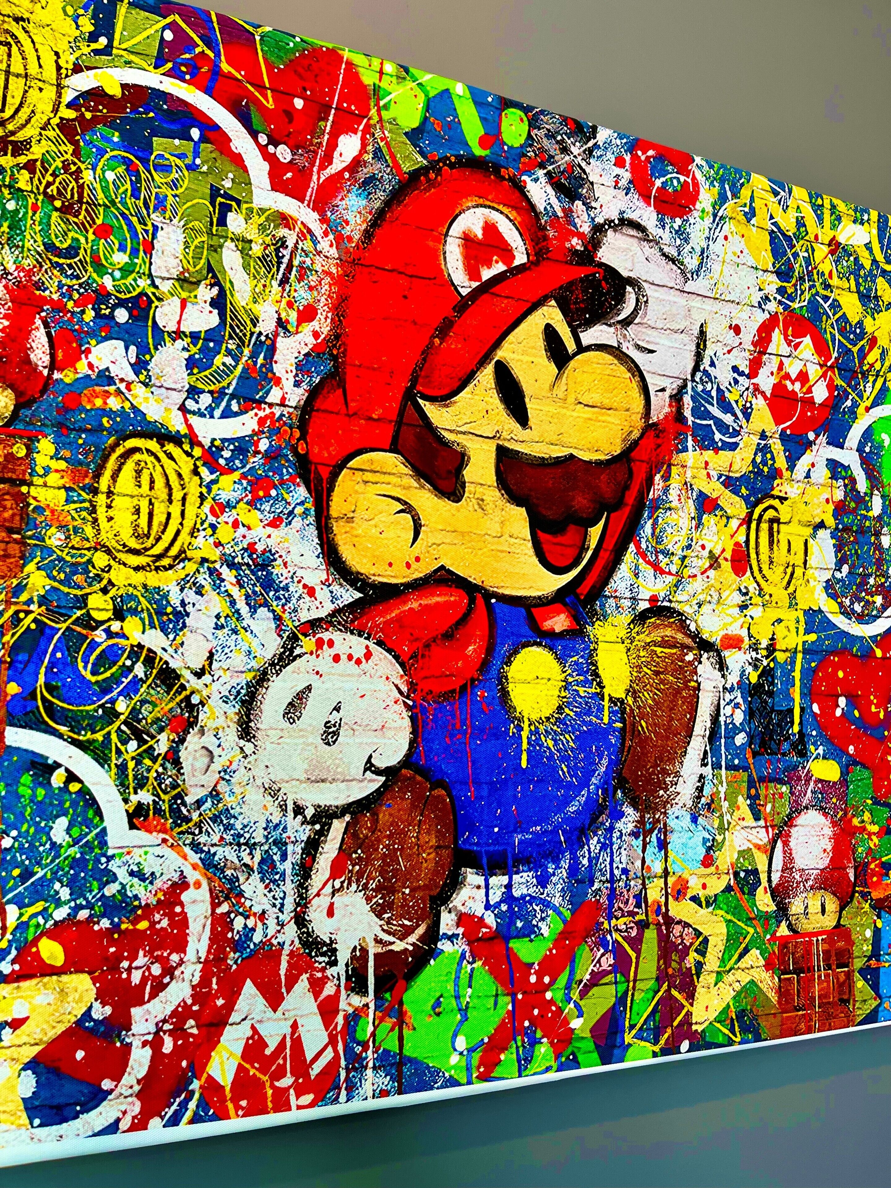 A colorful mural with a central figure, surrounded by abstract patterns and splashes of paint.