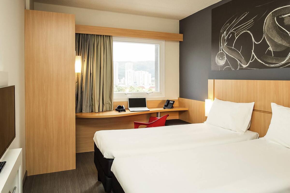 premium bedding, desk, laptop workspace, blackout curtains