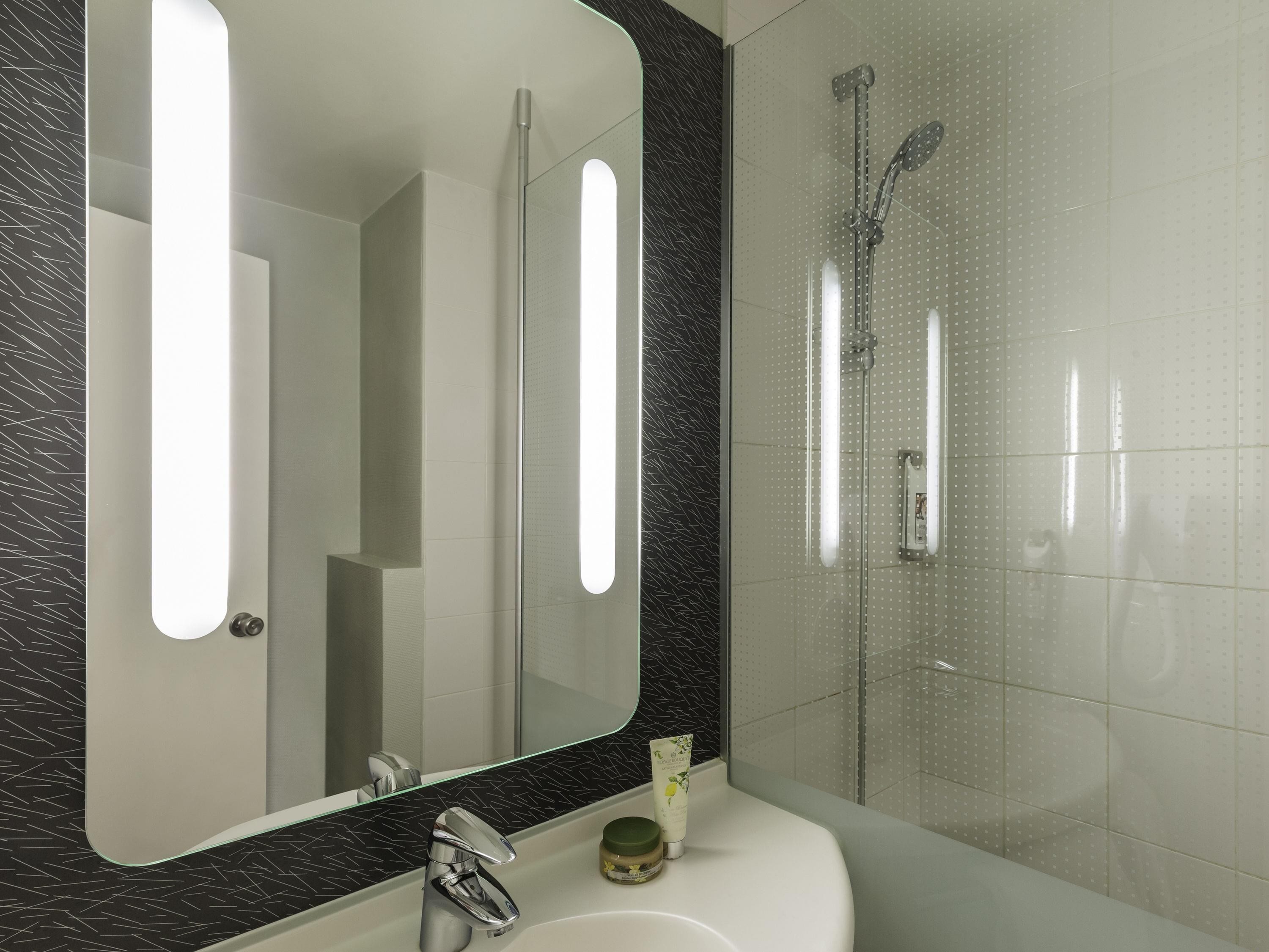 Premium bedding, desk, laptop workspace, blackout curtains. Ibis Paris Meudon Velizy