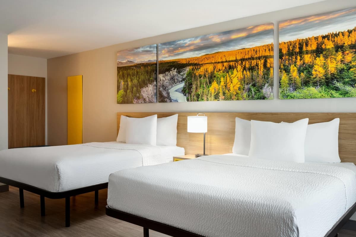 Deluxe Room, 2 Queen Beds, Non Smoking | Iron/ironing board, free WiFi, bed sheets, alarm clocks