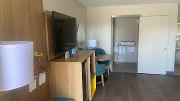 Room, 2 Queen Beds, Non Smoking (Mobility, Bathtub w/Grab bars) | Living area | TV