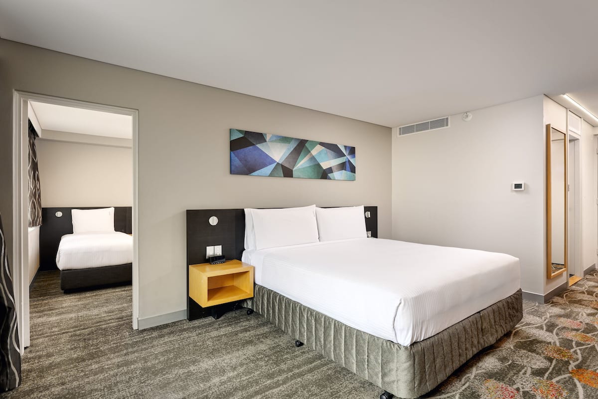 Premium Room, Multiple Beds | Minibar, in-room safe, desk, laptop workspace