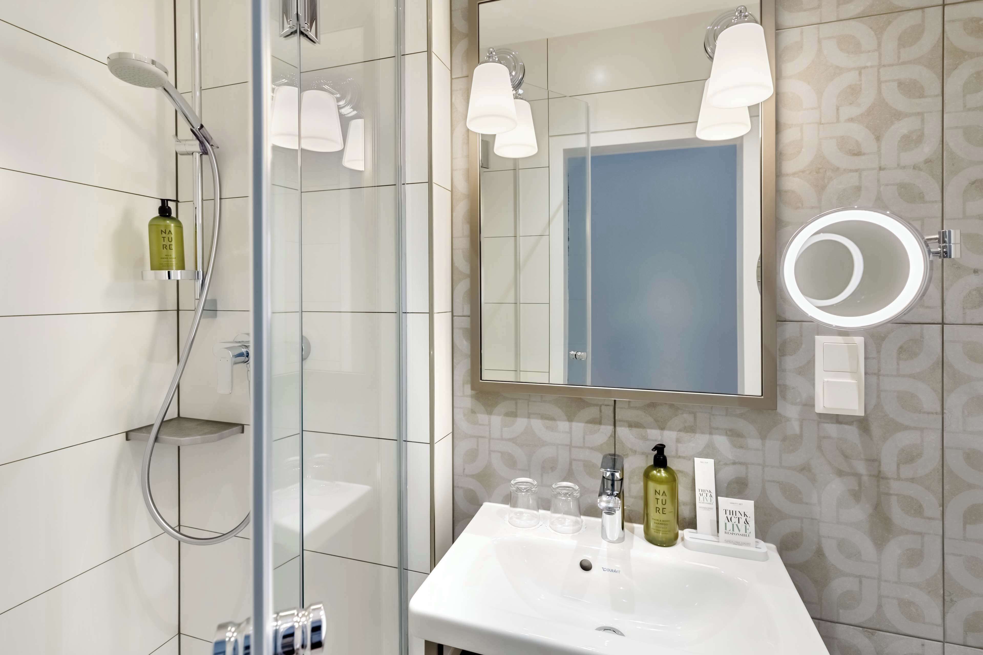 hair dryer, towels, soap, shampoo