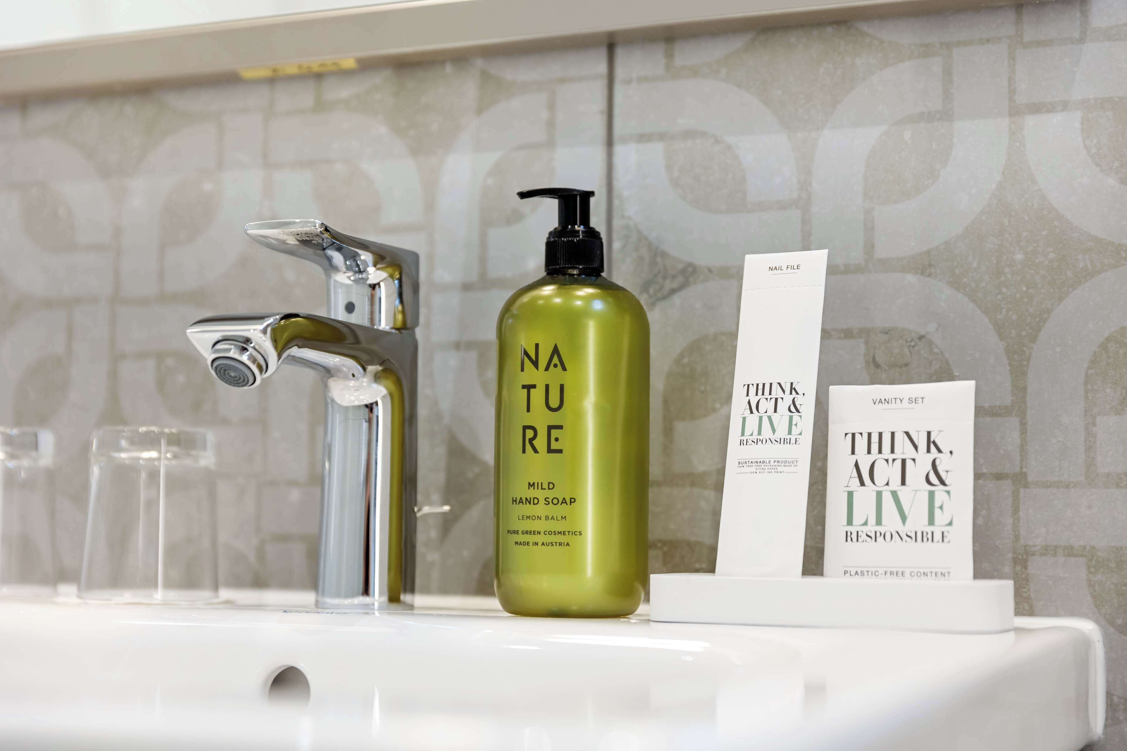 hair dryer, towels, soap, shampoo