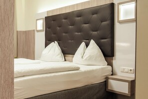 Hypo-allergenic bedding, minibar, in-room safe, desk