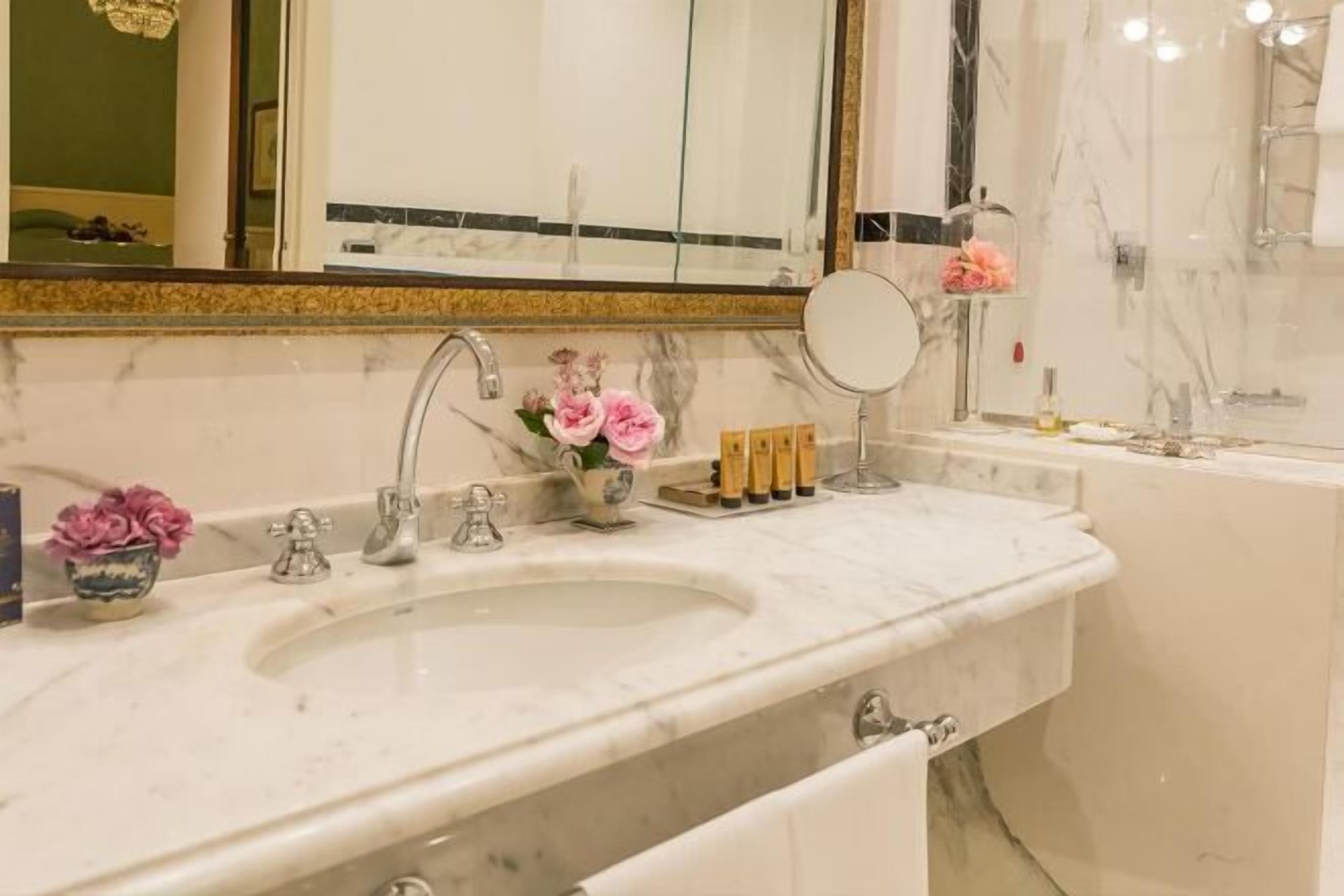 Rainfall showerhead, designer toiletries, hair dryer, bathrobes