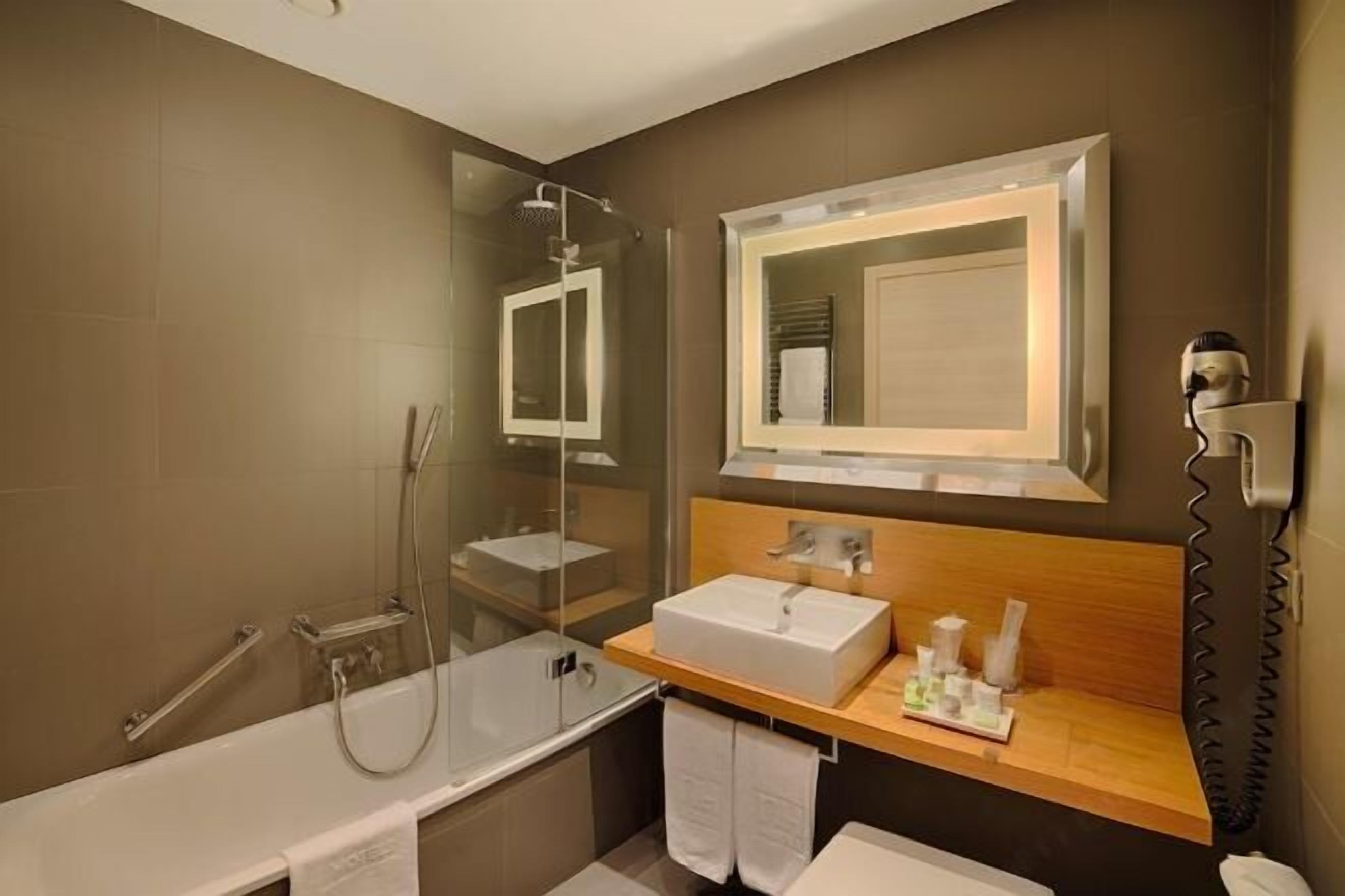 Shower, eco-friendly toiletries, hair dryer, bidet