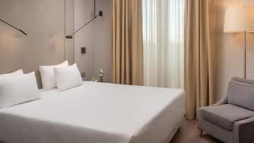 Superior Room | Minibar, in-room safe, desk, laptop workspace