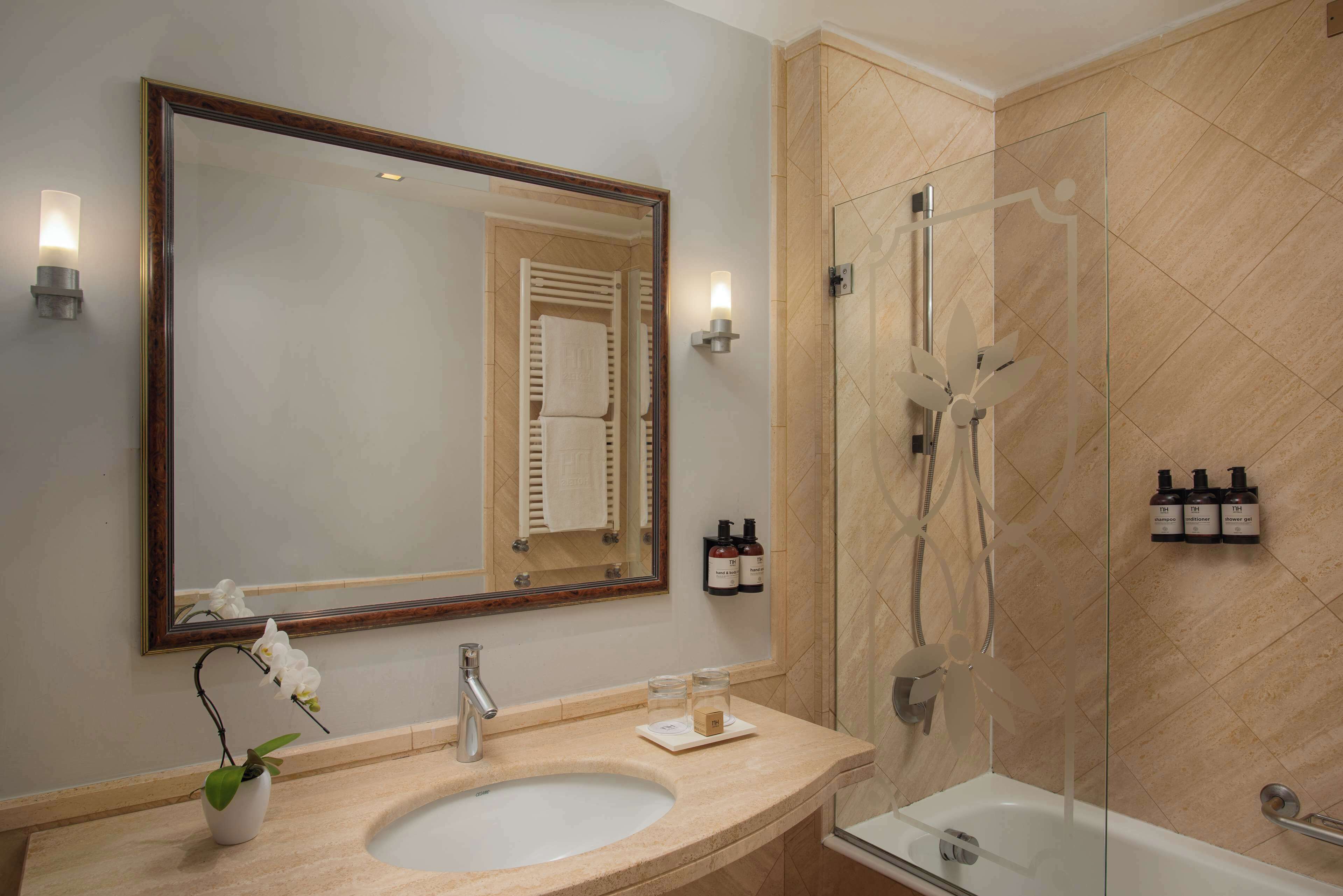 Shower, eco-friendly toiletries, hair dryer, bidet