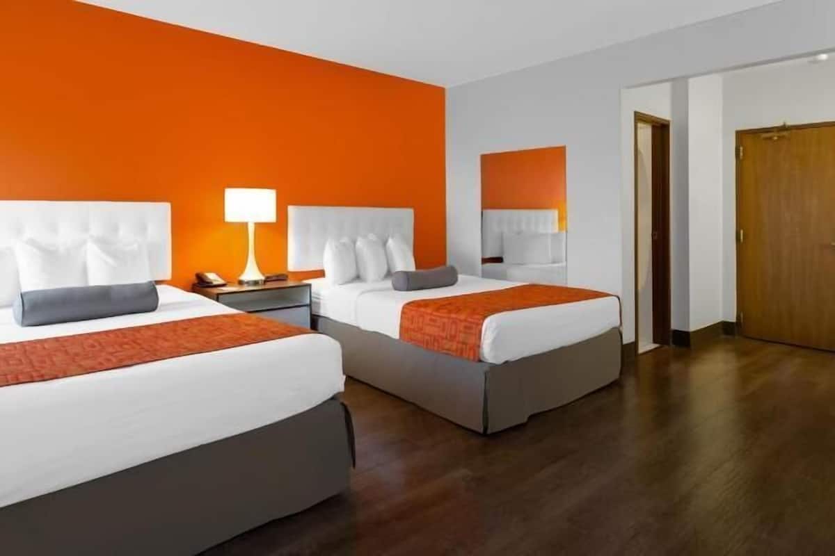 Premium bedding, blackout drapes, iron/ironing board