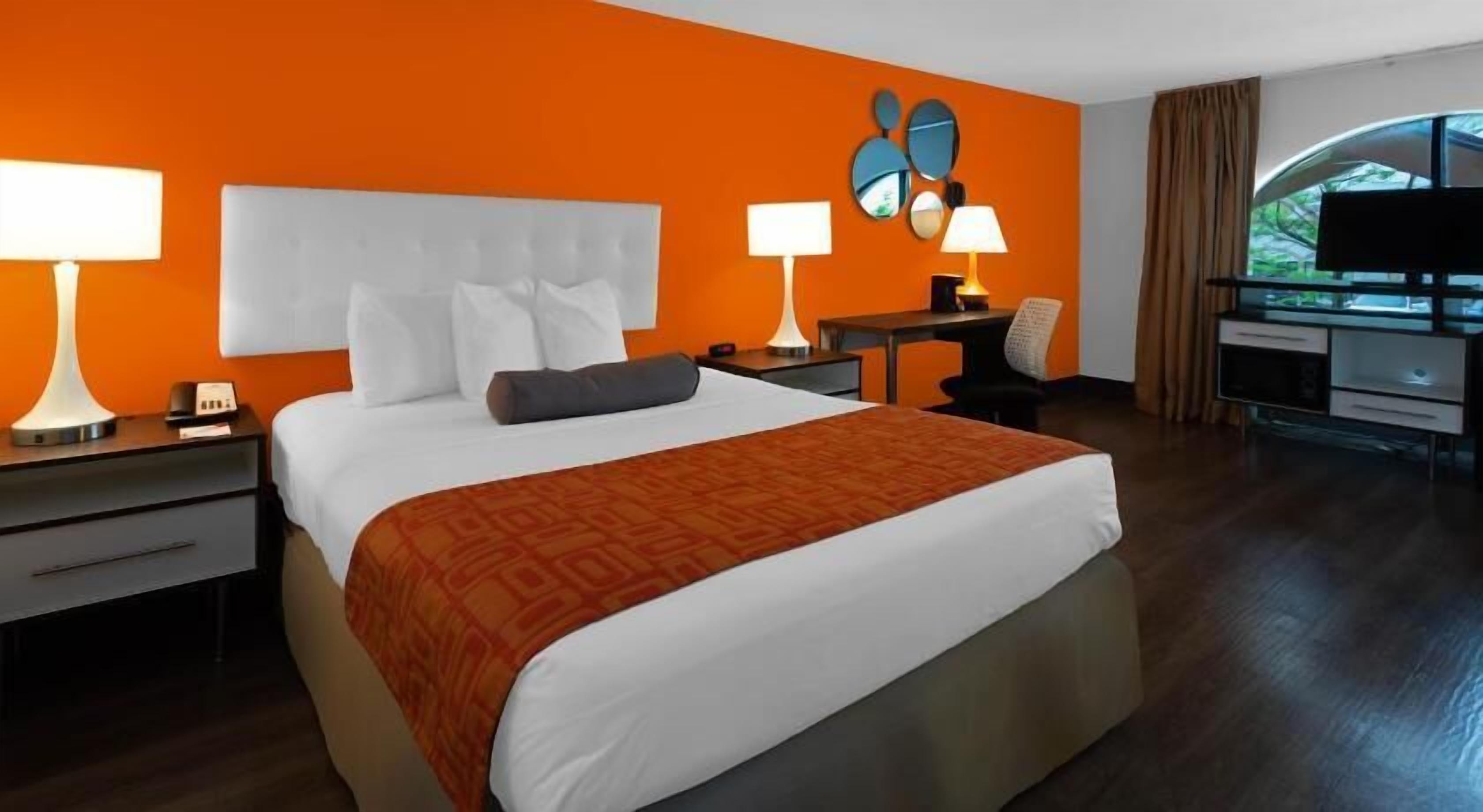 Premium bedding, blackout drapes, iron/ironing board