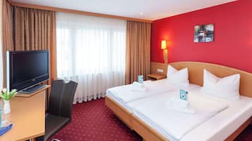 Hypo-allergenic bedding, iron/ironing board, free cots/infant beds