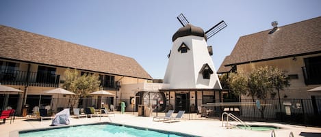 Outdoor pool, open 10:00 AM to 10:00 PM, free cabanas, pool umbrellas