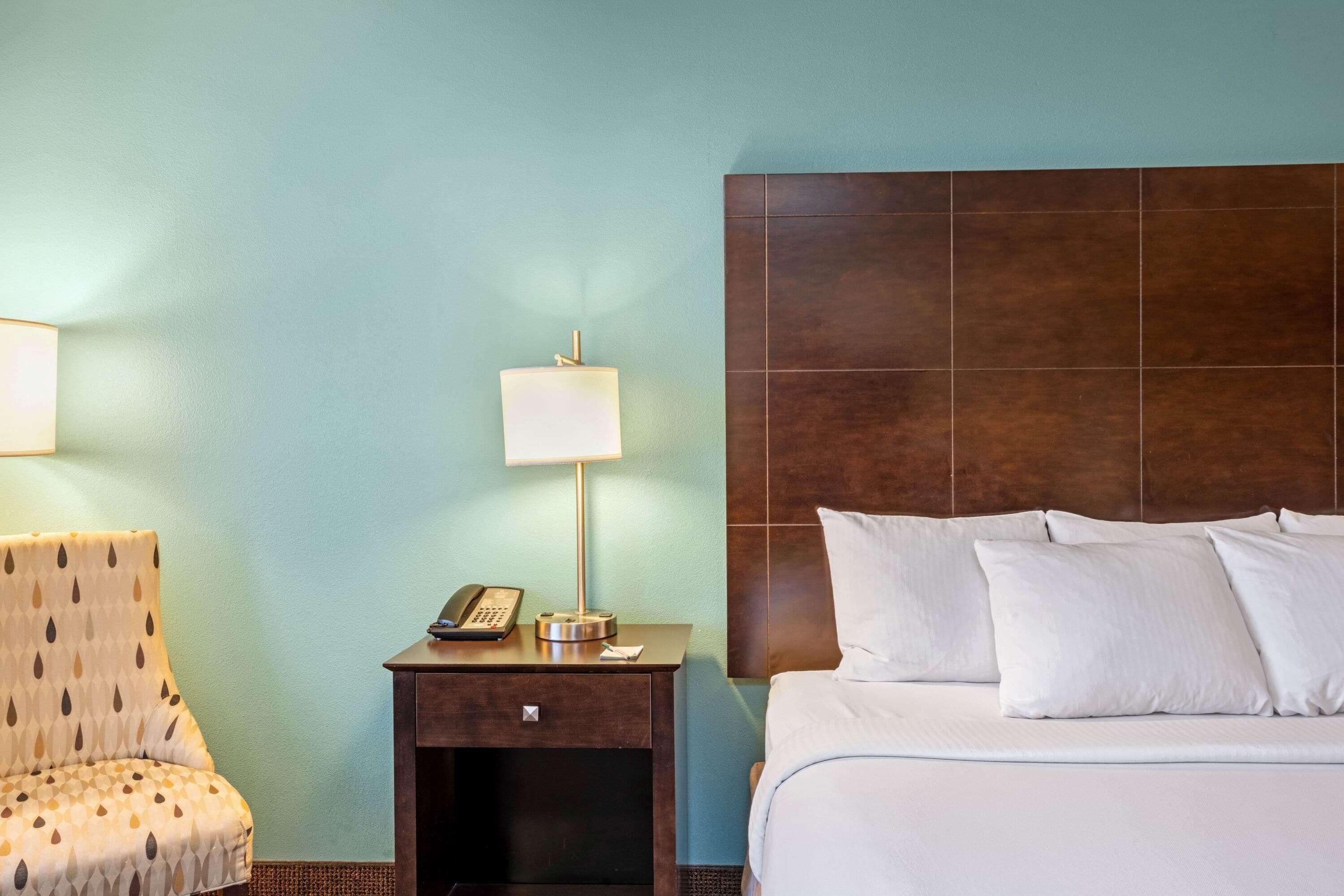 premium bedding, pillow-top beds, desk, iron/ironing board