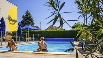 Seasonal outdoor pool, open 8:00 AM to 10:00 PM, pool loungers