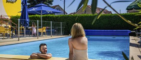 Seasonal outdoor pool, open 8:00 AM to 10:00 PM, sun loungers