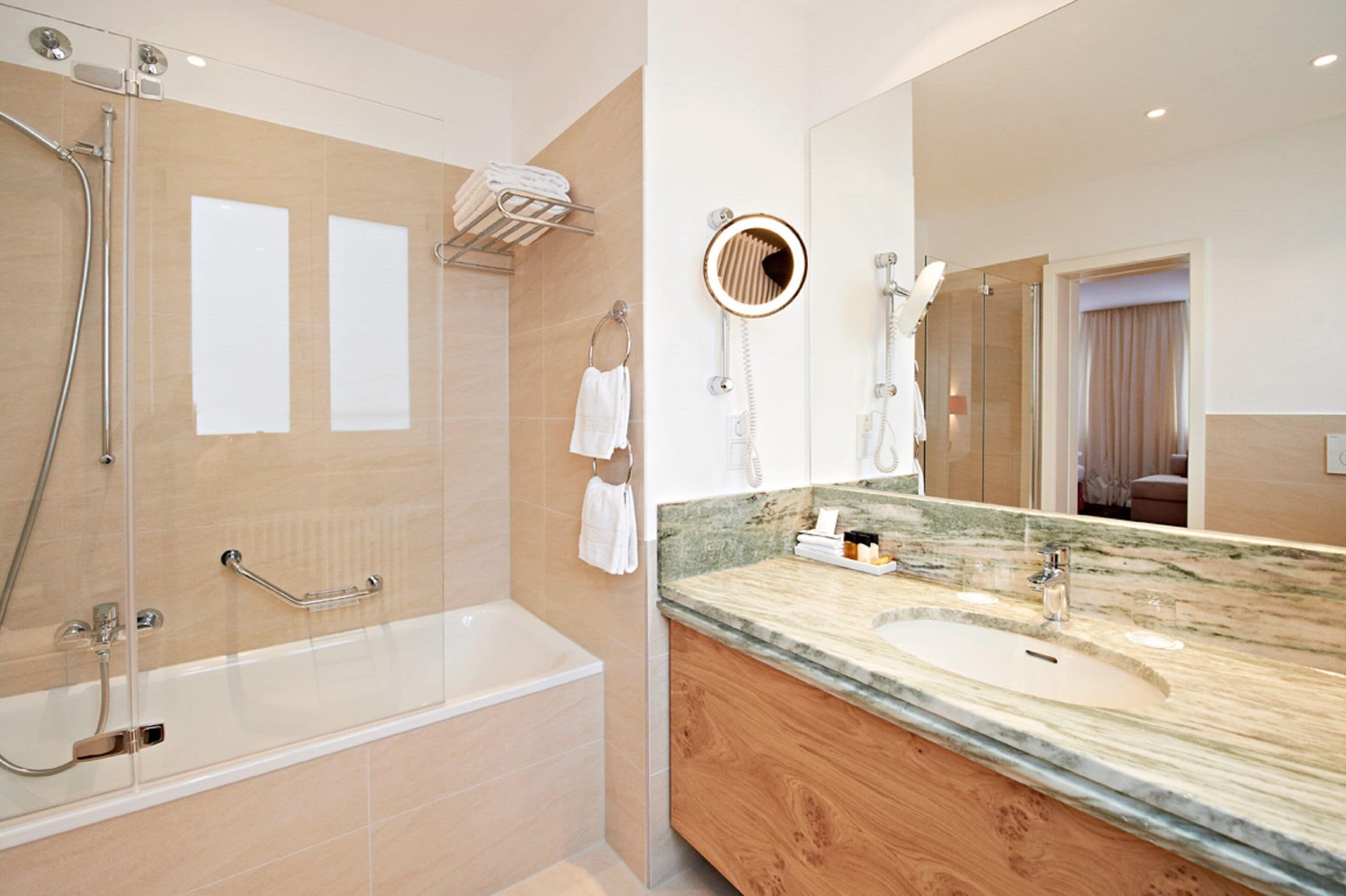 combined shower/bathtub, free toiletries, hair dryer, slippers