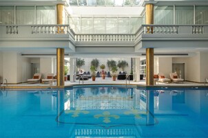 Indoor pool, open 7:00 AM to 9:00 PM, sun loungers