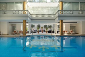 Indoor pool, open 7:00 AM to 9:00 PM, pool loungers