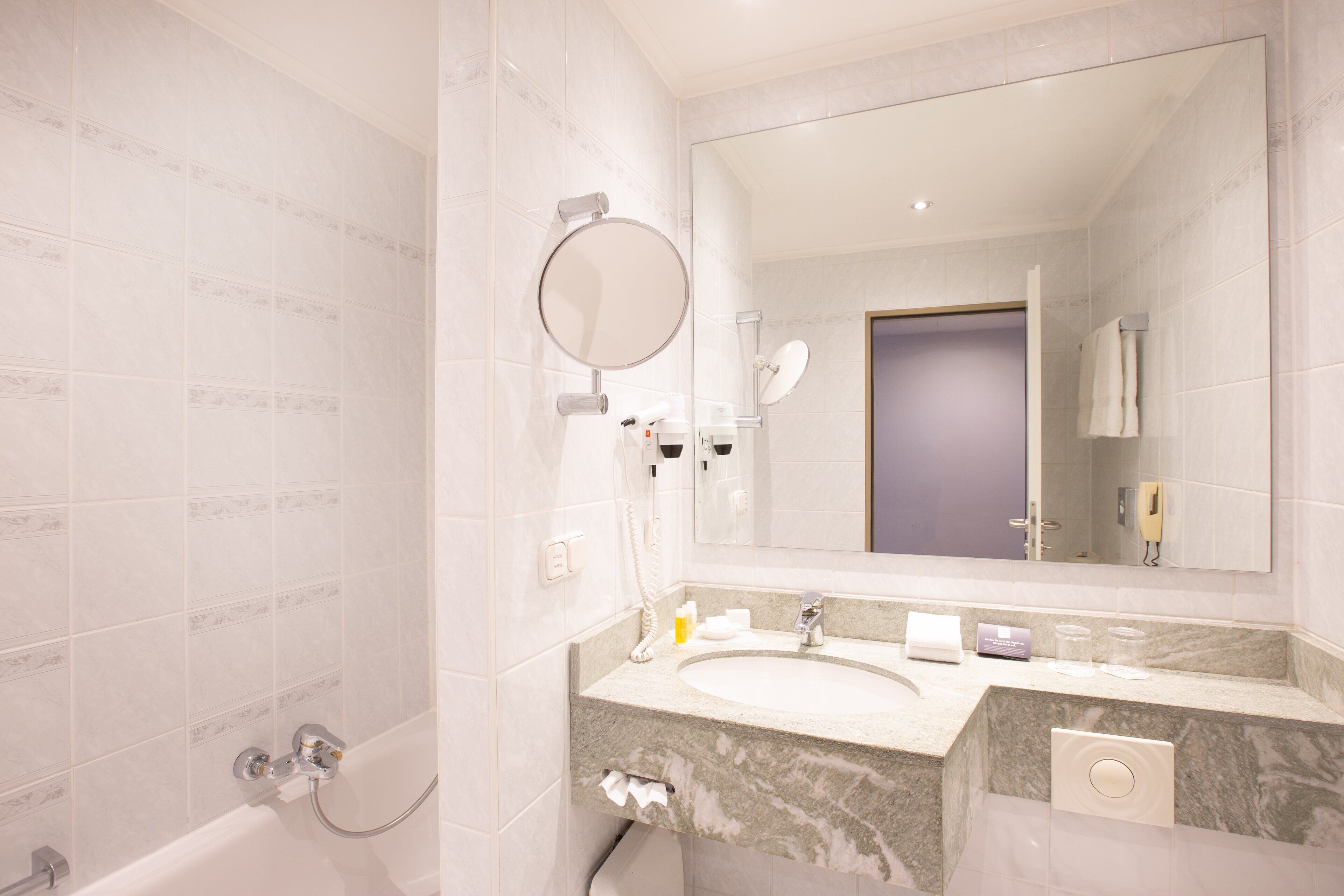 combined shower/bathtub, free toiletries, hair dryer, towels