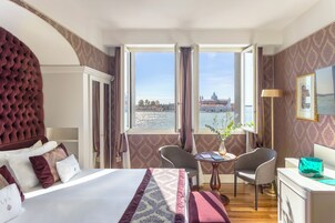 Premium bedding, down duvets, minibar, in-room safe