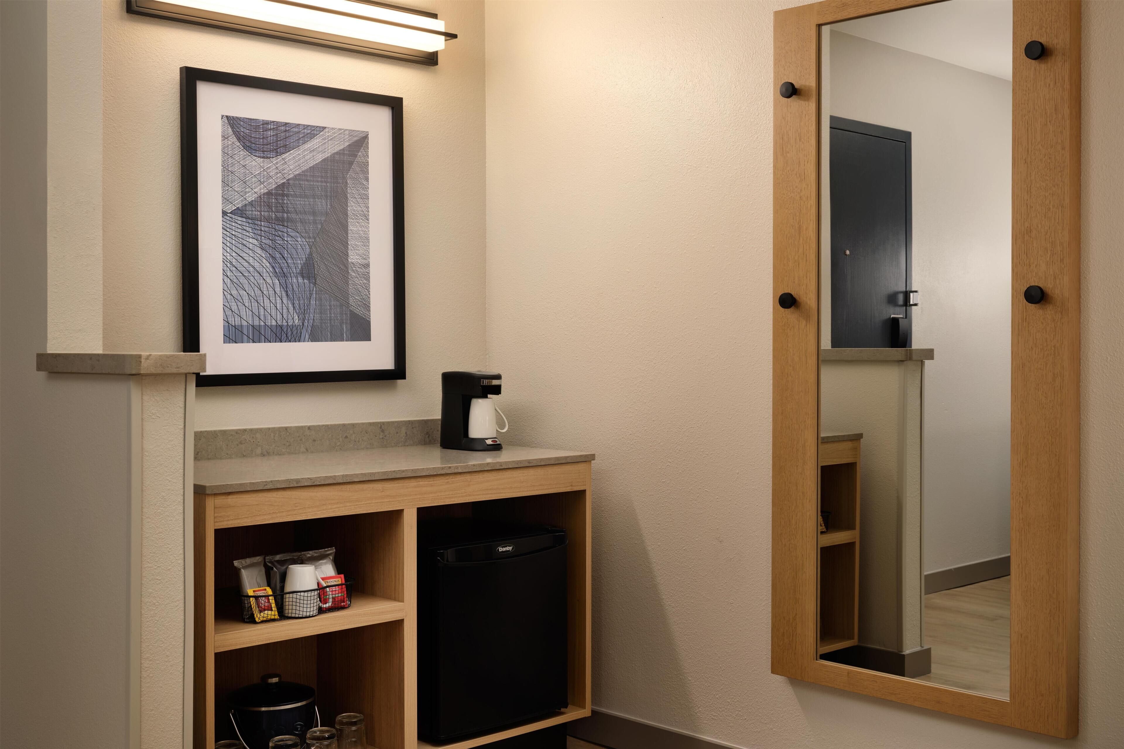 Premium bedding, desk, laptop workspace, blackout drapes