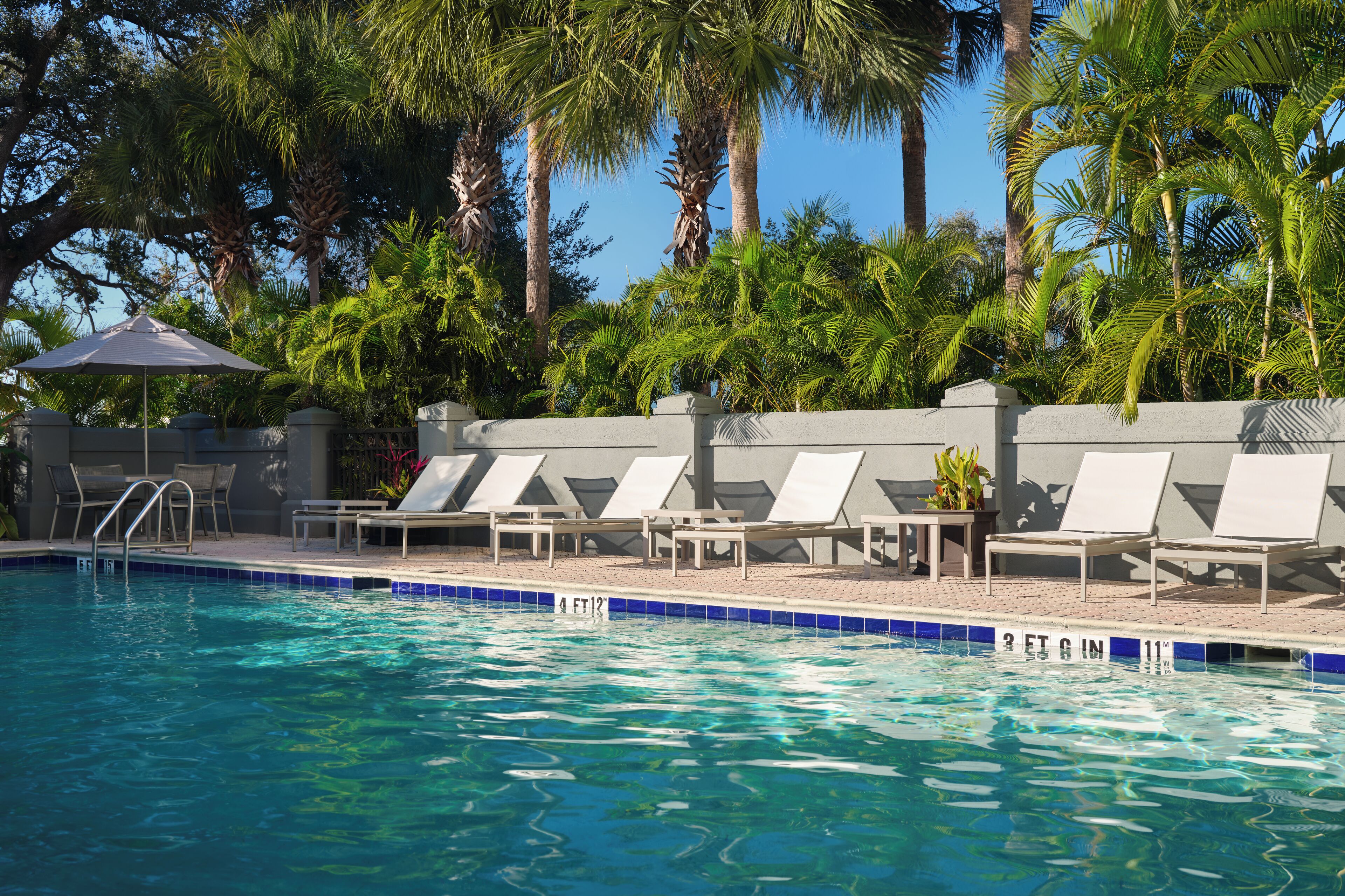 Outdoor pool, open 10:00 AM to 10:00 PM, sun loungers