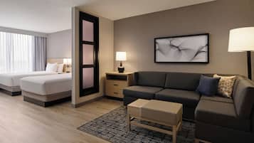 Premium bedding, desk, laptop workspace, blackout drapes