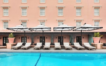 Outdoor pool, open 8:00 AM to 8:00 PM, sun loungers at Mills House Charleston, Curio Collection by Hilton