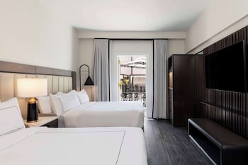 Room, 2 Queen Beds, Pool View (Cabana) | In-room safe, individually decorated, individually furnished, desk at Mills House Charleston, Curio Collection by Hilton