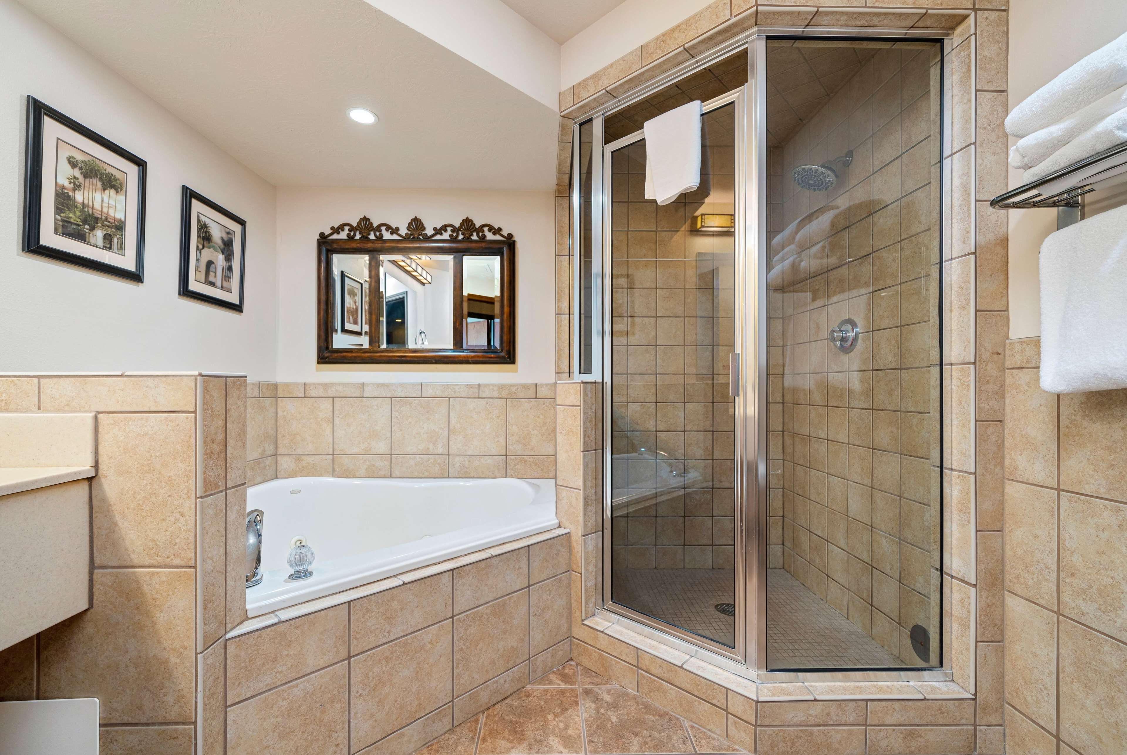 suite, 2 bedrooms, non smoking (1 king bed and 2 queen beds) | bathroom | combined shower/bathtub, free toiletries, hair dryer, towels