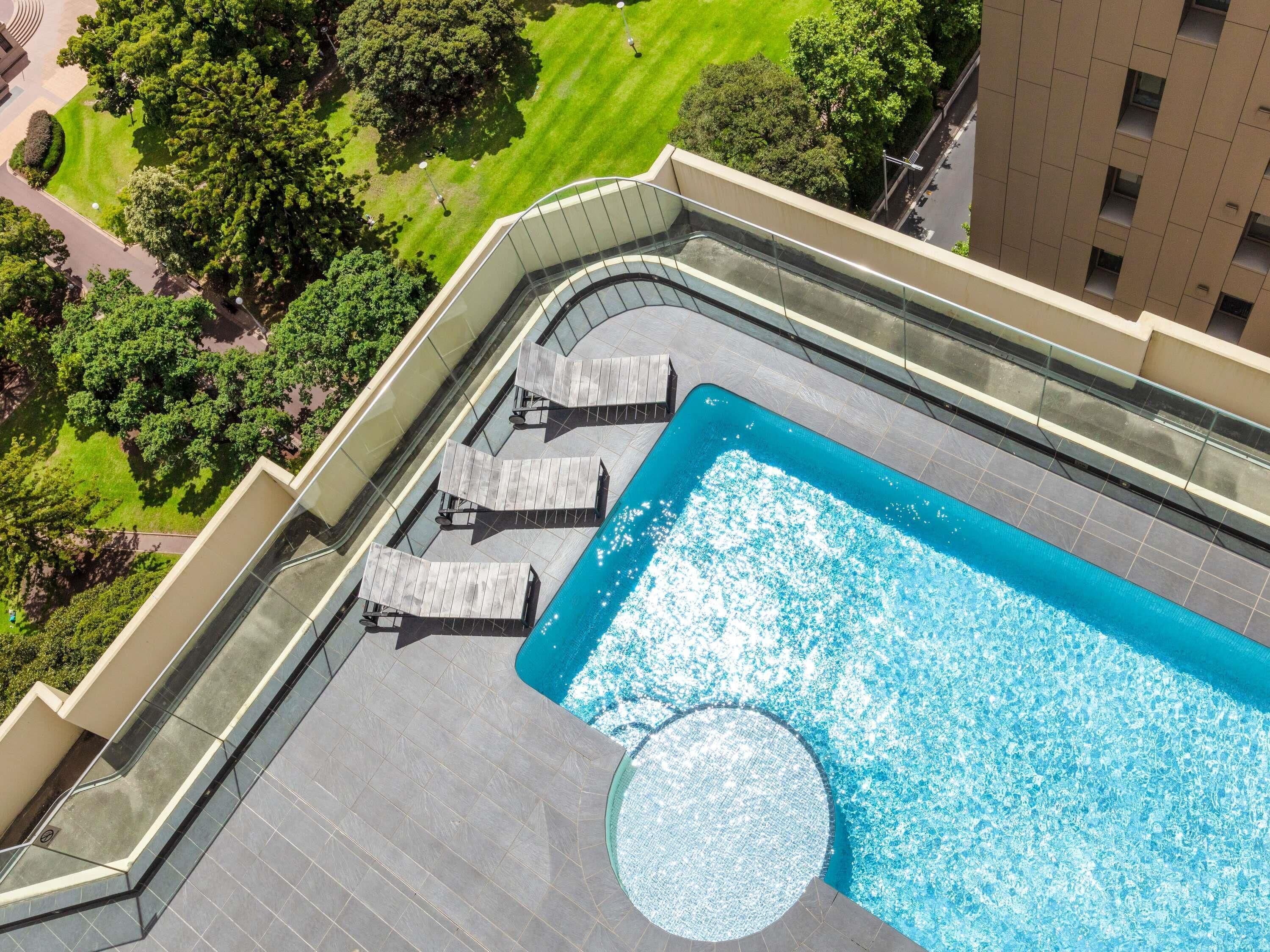 Outdoor pool, open 6:00 AM to 10:00 PM, sun loungers