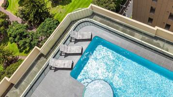 Outdoor pool, open 6:00 AM to 10:00 PM, sun loungers