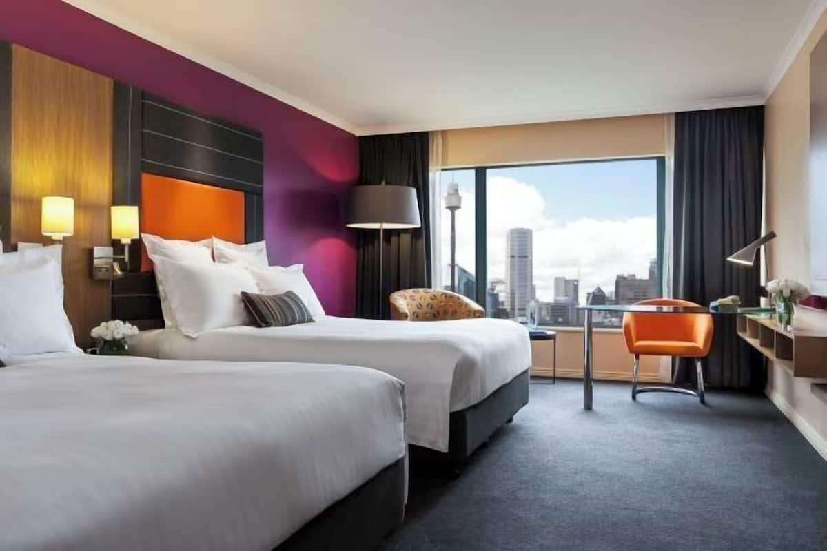 Italiaanse Frette-lakens, luxe beddengoed, pillowtop-bedden, een minibar