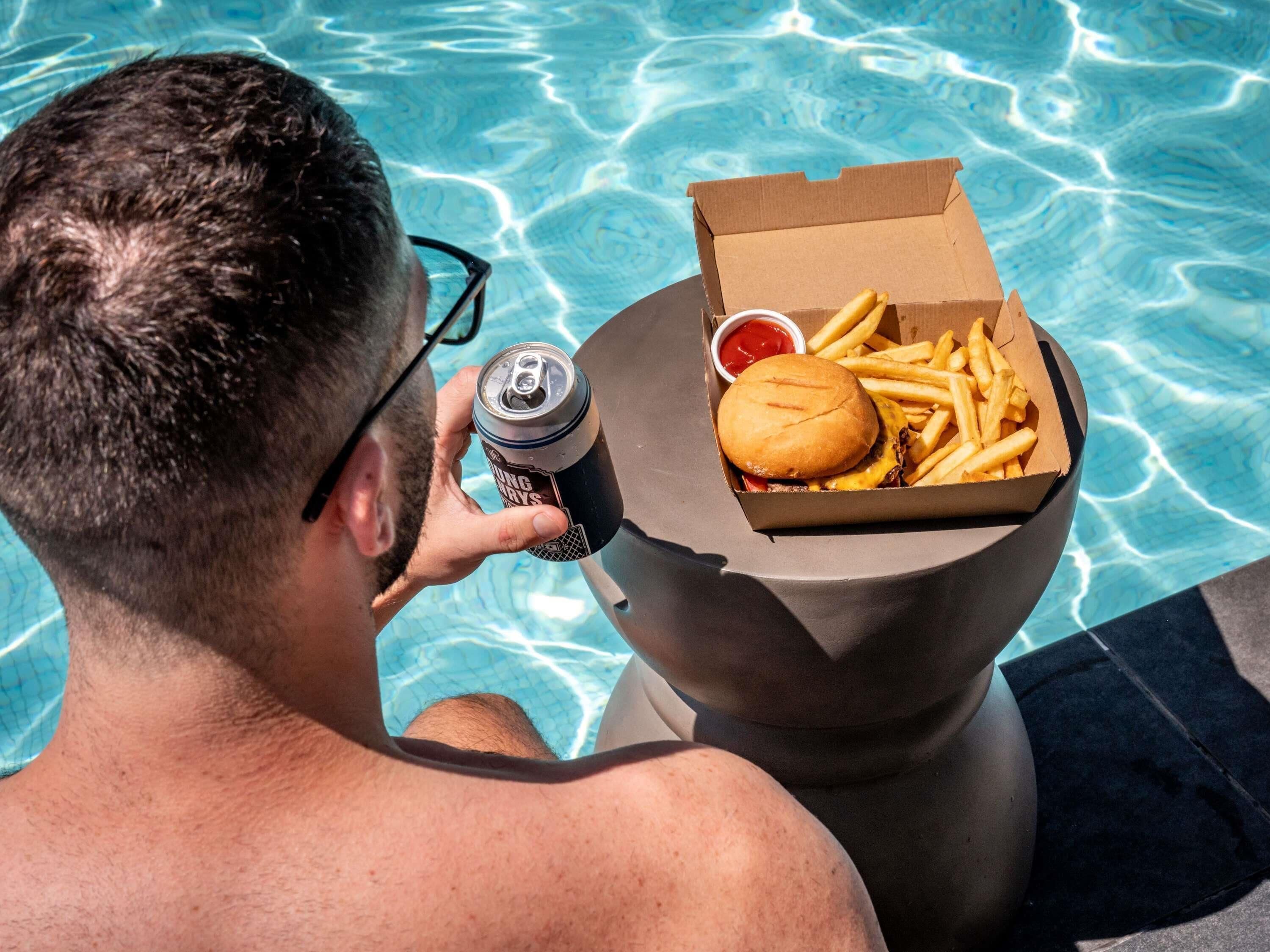 Outdoor pool, open 6:00 AM to 10:00 PM, sun loungers